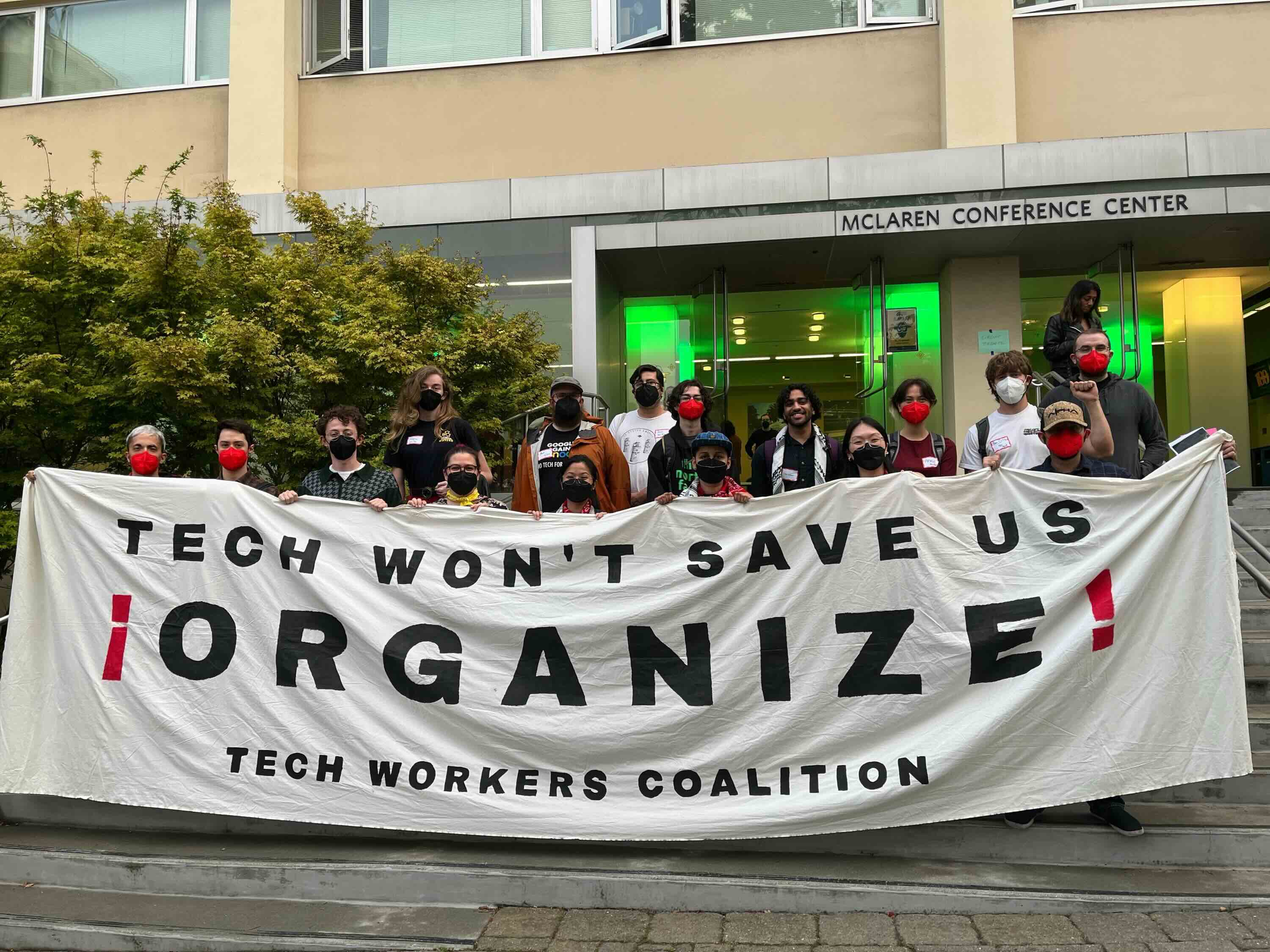Group photo from 2024 Circuit Breakers Conference with banner: Tech Won't Save Us\: Organize!