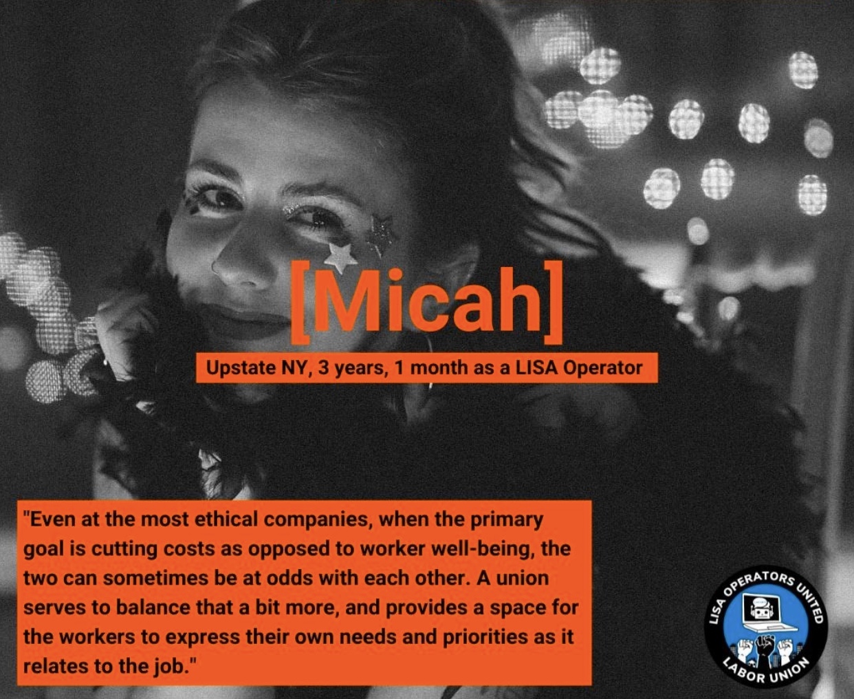 A black and white photo of Micah, smiling and wearing stars on her cheek